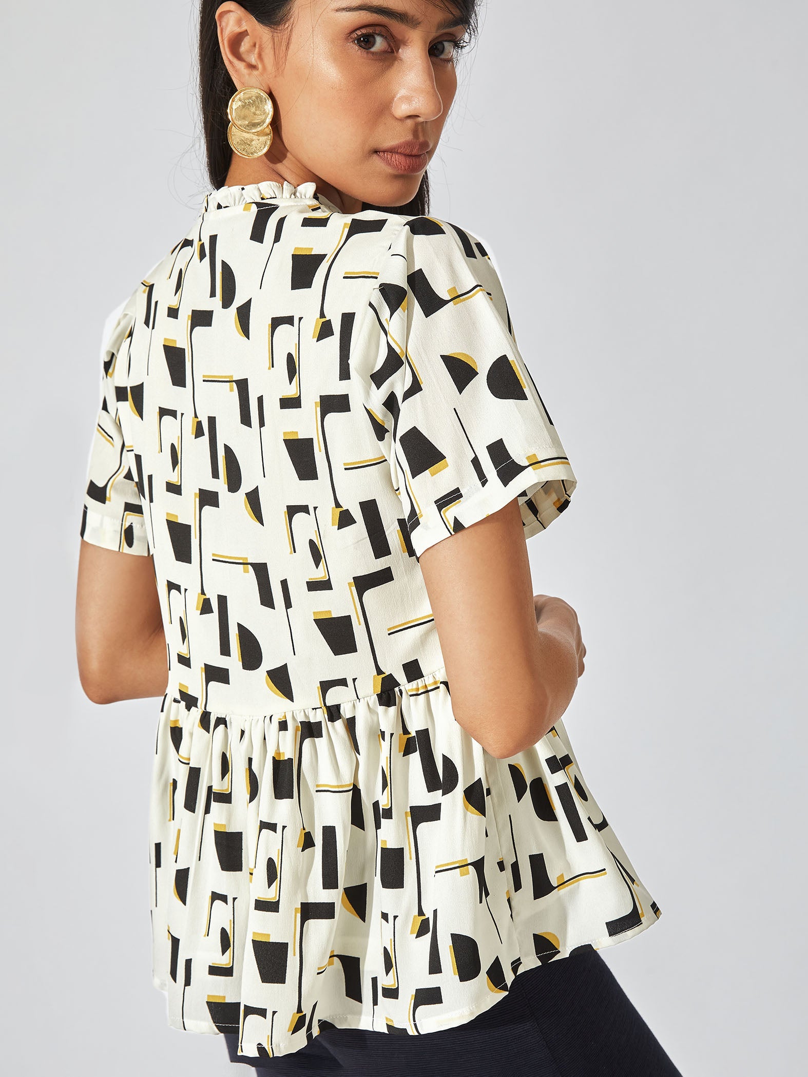 Monochrome Peplum Top