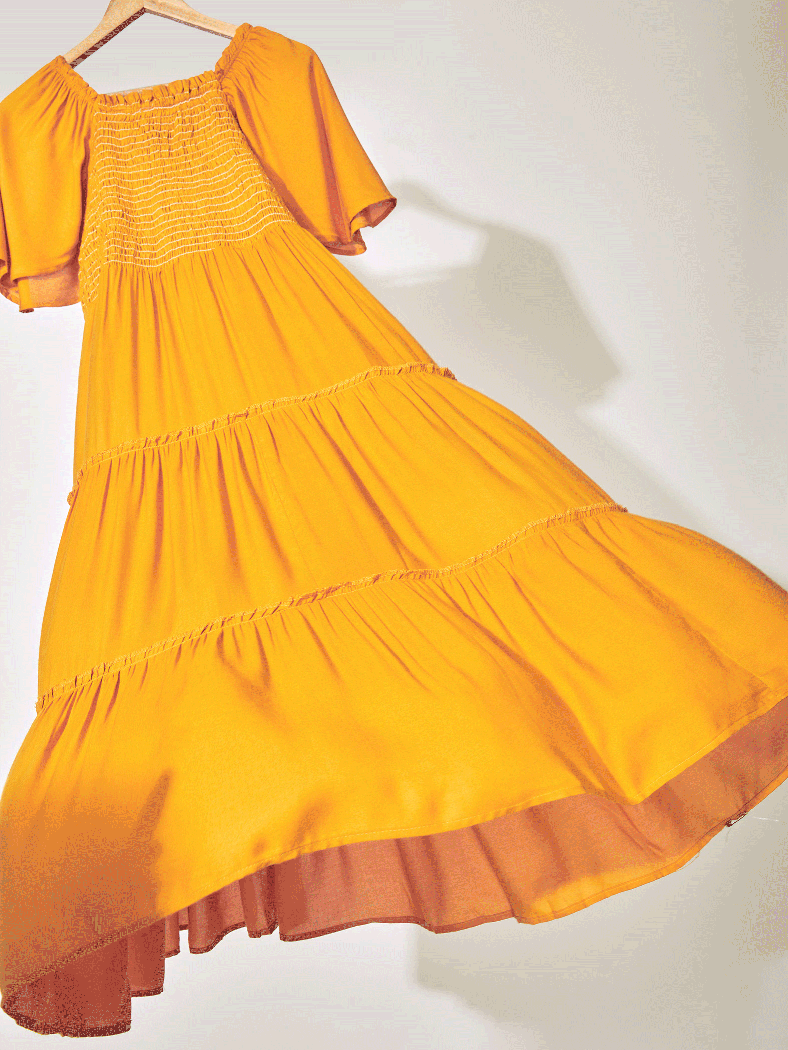 mustard smocked tie dress