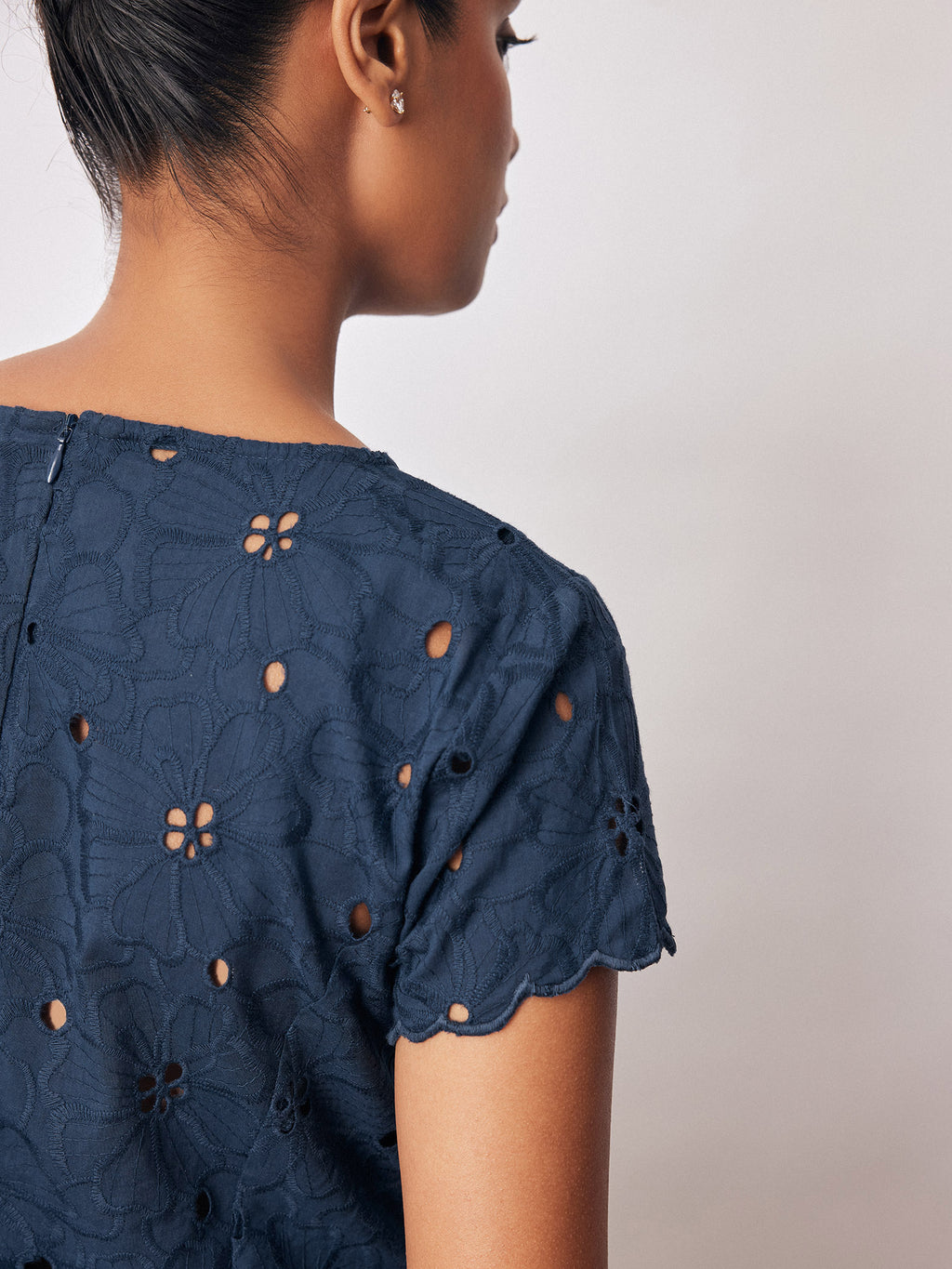 Navy Schiffli Peplum Top