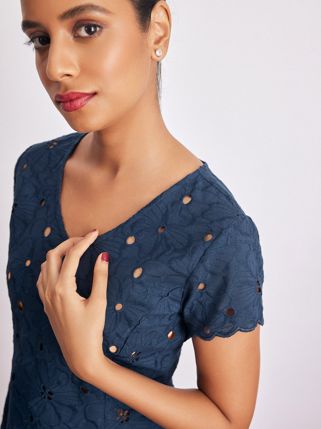 Navy Schiffli Peplum Top