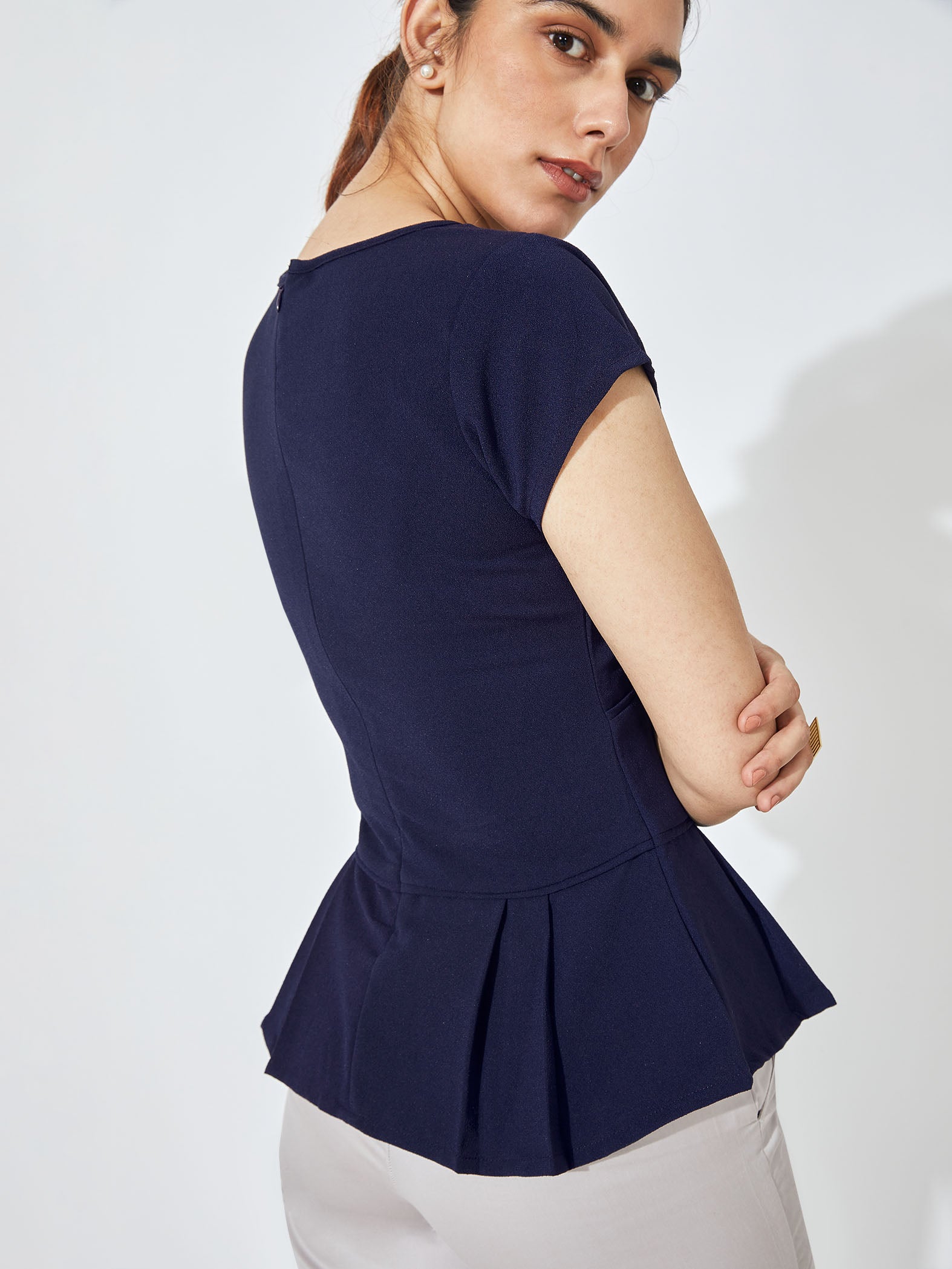 Dark blue peplum top on sale